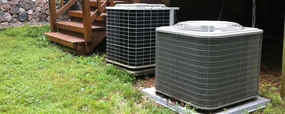Heat pump installation and service units outside a home in Olathe, KS